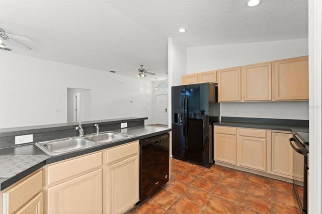 11341 AUTUMN WIND LOOP, Clermont, FL 34711