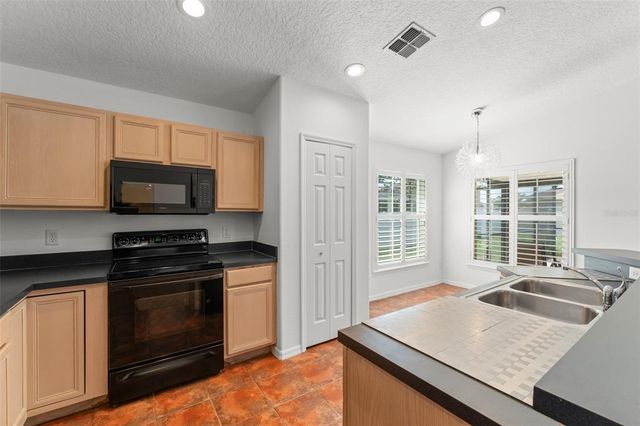 11341 AUTUMN WIND LOOP, Clermont, FL 34711