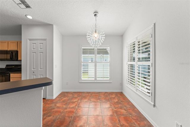 11341 AUTUMN WIND LOOP, Clermont, FL 34711
