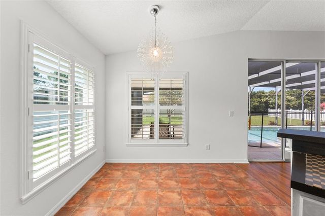11341 AUTUMN WIND LOOP, Clermont, FL 34711