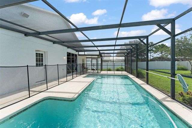 11341 AUTUMN WIND LOOP, Clermont, FL 34711