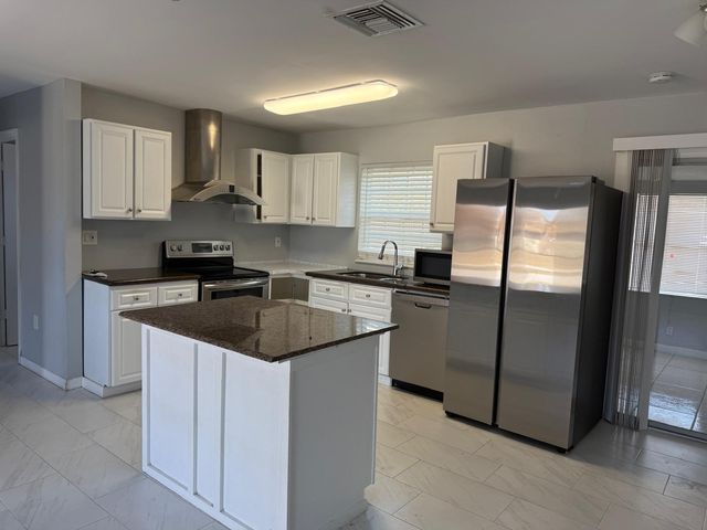 107 NW Curtis Street, Port St. Lucie, Port St Lucie, FL 34983