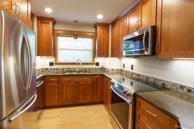 3410 Hogback Road, Handy Township, MI 48836