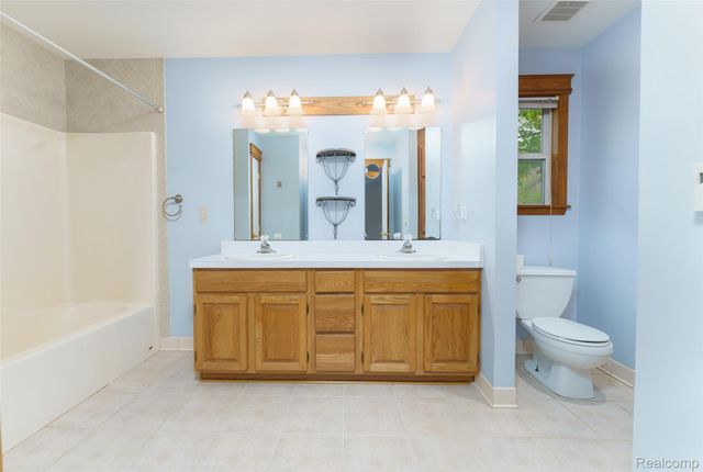 3410 Hogback Road, Handy Township, MI 48836