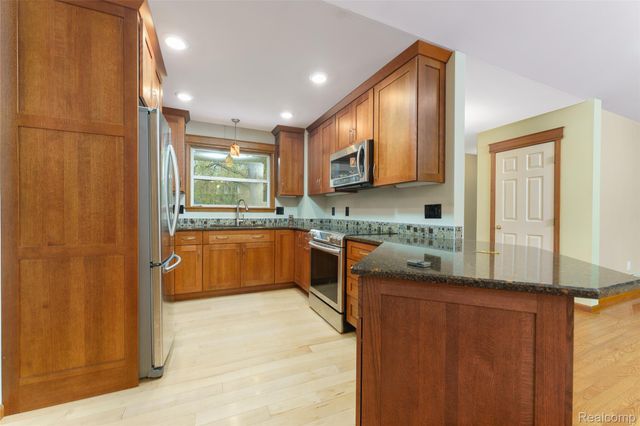 3410 Hogback Road, Handy Township, MI 48836