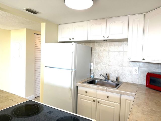 7665 SUN ISLAND DRIVE S 409, South Pasadena, FL 33707
