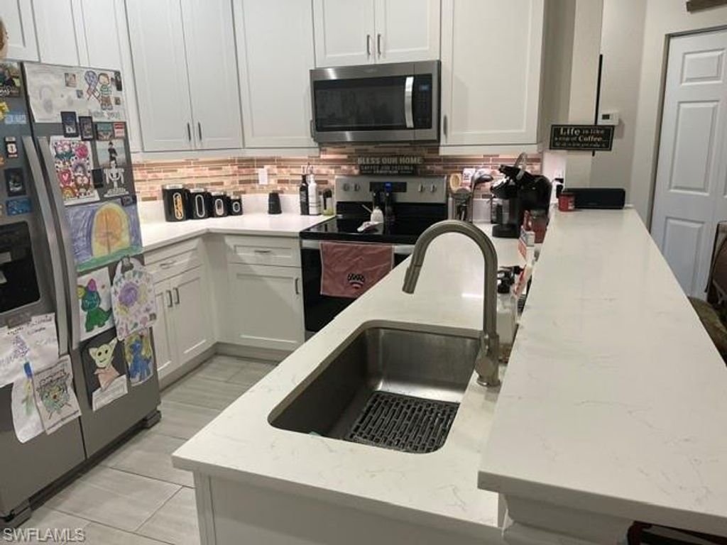 Image 8 of property listing at 1137 Winding Pines CIR 203, Cape Coral, FL 33909