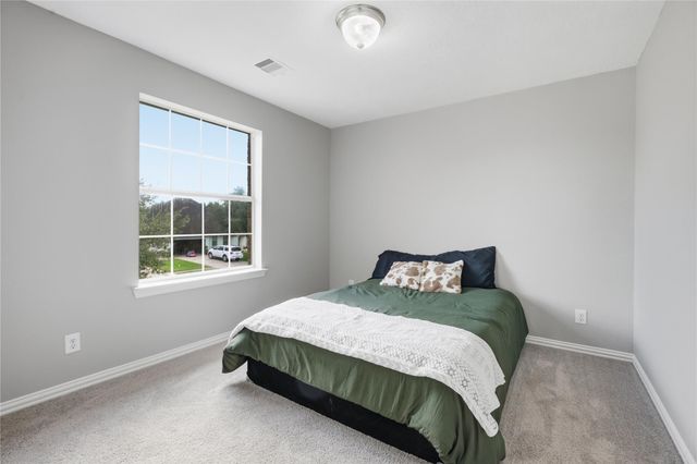 9114 Creekside Court, Hitchcock, TX 77563