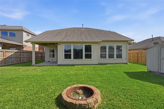 9114 Creekside Court, Hitchcock, TX 77563