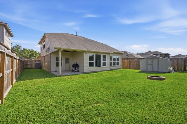9114 Creekside Court, Hitchcock, TX 77563