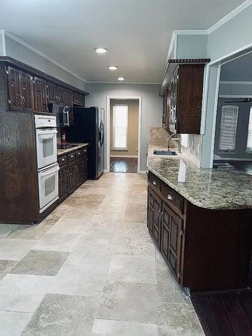 9406 Hunters Creek Drive, Dallas, TX 75243