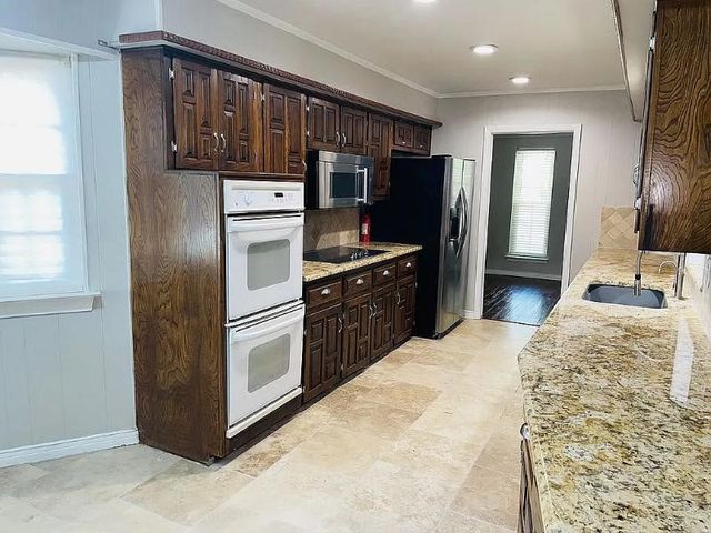 9406 Hunters Creek Drive, Dallas, TX 75243