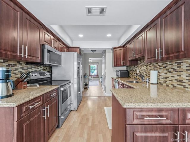 54 Hidden Ridge Drive, Syosset, NY 11791