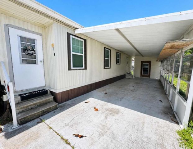1925 MARY LANE, Holiday, FL 34690