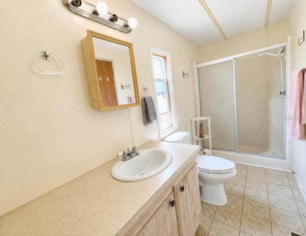 1925 MARY LANE, Holiday, FL 34690