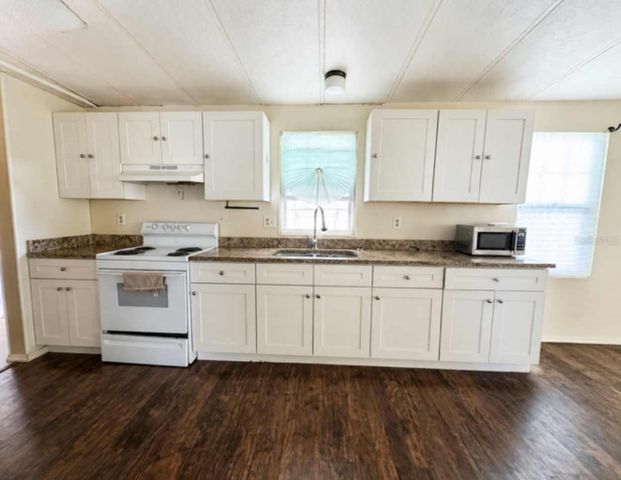 1925 MARY LANE, Holiday, FL 34690