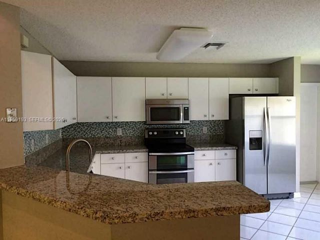 1653 Zenith Way, Weston, FL 33327