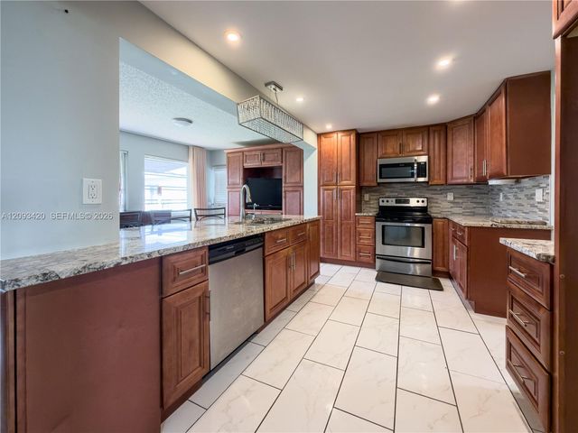 310 NW 25th Court, Pompano Beach, FL 33064