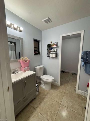 1715 50th TER SW, Naples, FL 34116