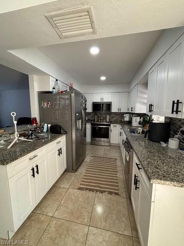 1715 50th TER SW, Naples, FL 34116