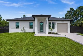1039 Bassinger Ave S, Lehigh Acres, FL 33974