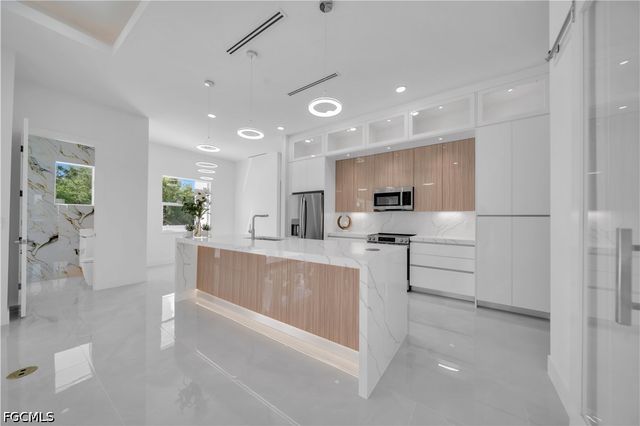 2703 34th ST SW, Lehigh Acres, FL 33976