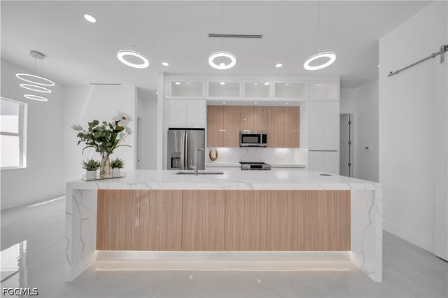 2703 34th ST SW, Lehigh Acres, FL 33976