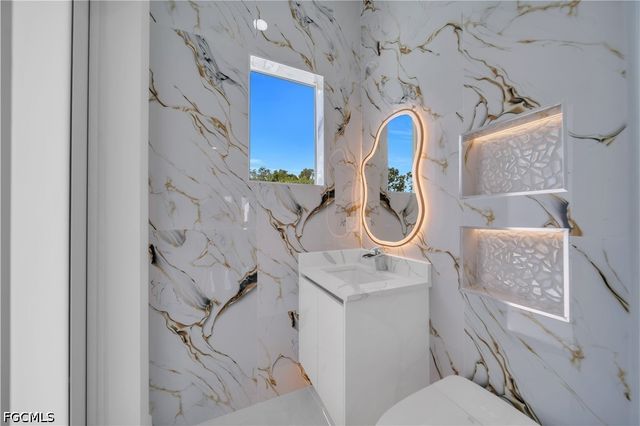 2703 34th ST SW, Lehigh Acres, FL 33976