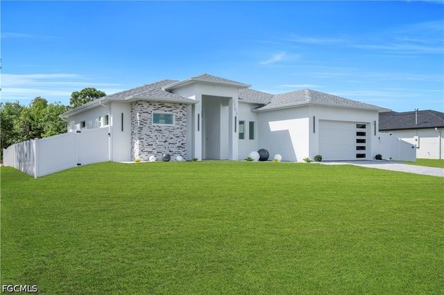 2703 34th ST SW, Lehigh Acres, FL 33976