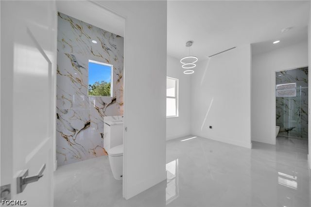 2703 34th ST SW, Lehigh Acres, FL 33976