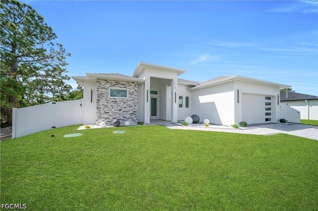 2703 34th ST SW, Lehigh Acres, FL 33976