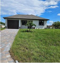 128 Nave AVE S, Lehigh Acres, FL 33974