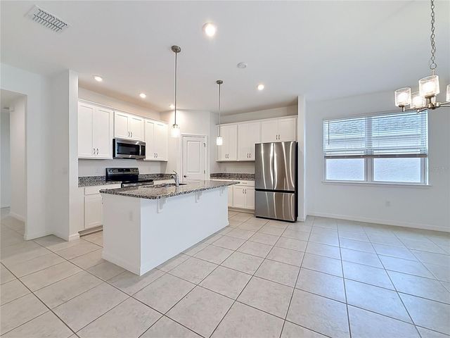 418 QUAYSIDE AVENUE, Mascotte, FL 34753