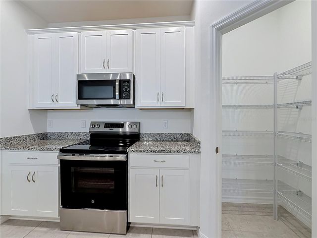 418 QUAYSIDE AVENUE, Mascotte, FL 34753