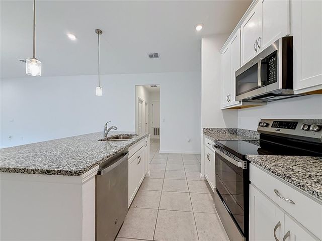 418 QUAYSIDE AVENUE, Mascotte, FL 34753