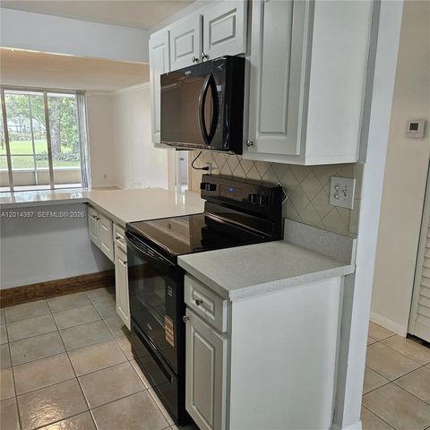 3070 NW 48th Ter 104, Lauderdale Lakes, FL 33313