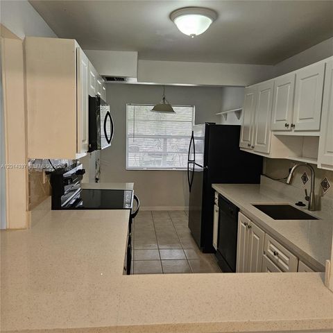 3070 NW 48th Ter 104, Lauderdale Lakes, FL 33313