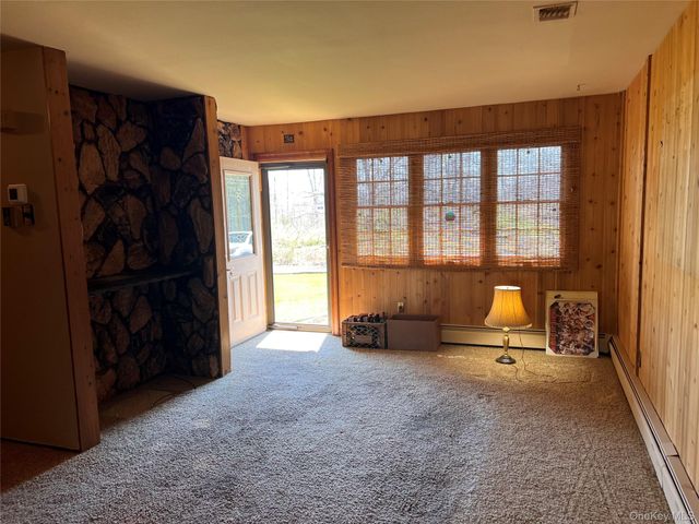 27 W Tiana Road A, Hampton Bays, NY 11946