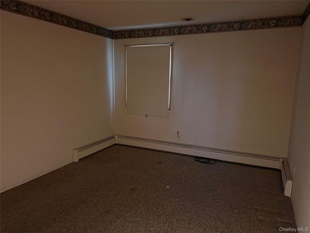 27 W Tiana Road A, Hampton Bays, NY 11946