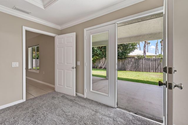 1061 SW BENSCHOP Avenue, Port St. Lucie, Port St Lucie, FL 34953