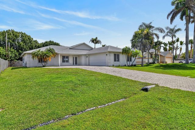 1061 SW BENSCHOP Avenue, Port St. Lucie, Port St Lucie, FL 34953