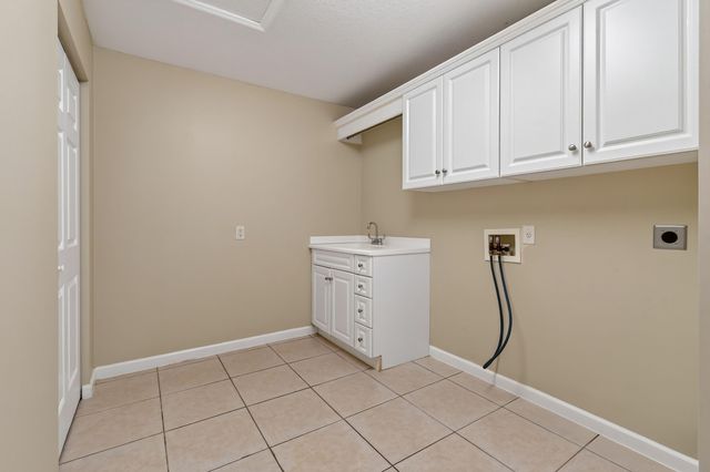 1061 SW BENSCHOP Avenue, Port St. Lucie, Port St Lucie, FL 34953