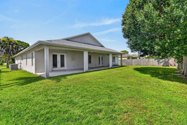 1061 SW BENSCHOP Avenue, Port St. Lucie, Port St Lucie, FL 34953