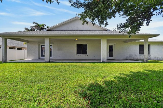 1061 SW BENSCHOP Avenue, Port St. Lucie, Port St Lucie, FL 34953