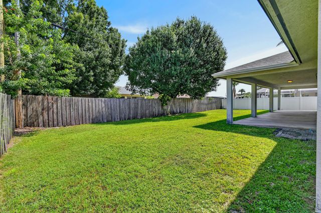 1061 SW BENSCHOP Avenue, Port St. Lucie, Port St Lucie, FL 34953