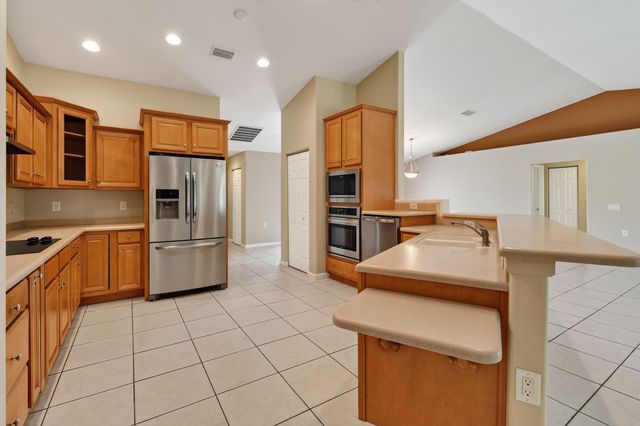 1061 SW BENSCHOP Avenue, Port St. Lucie, Port St Lucie, FL 34953