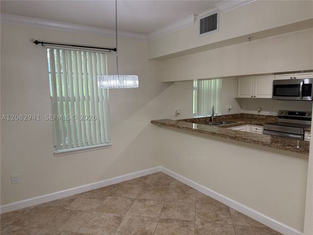 6956 W Sample Rd 6956, Coral Springs, FL 33067