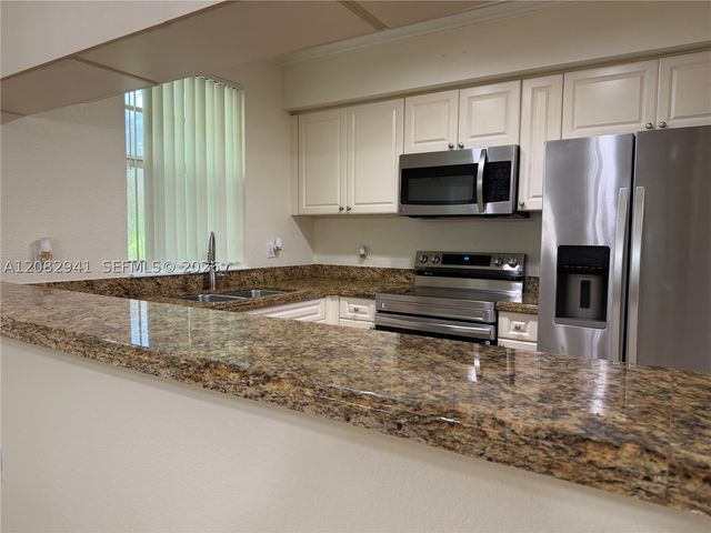 6956 W Sample Rd 6956, Coral Springs, FL 33067