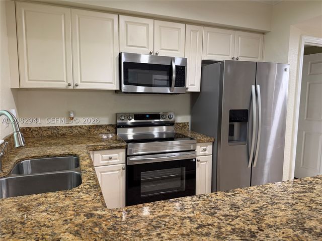 6956 W Sample Rd 6956, Coral Springs, FL 33067
