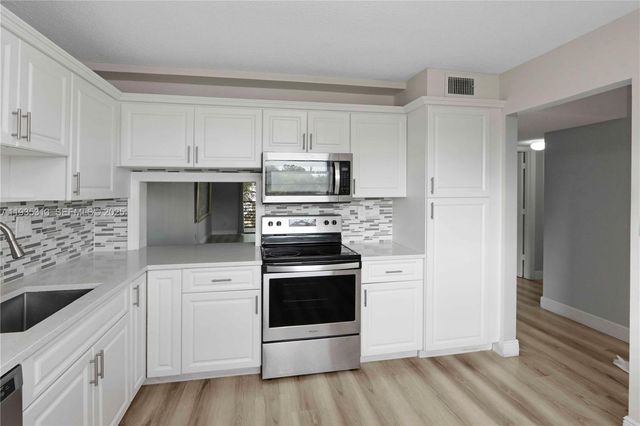 4930 E Sabal Palm Blvd 306, Tamarac, FL 33319